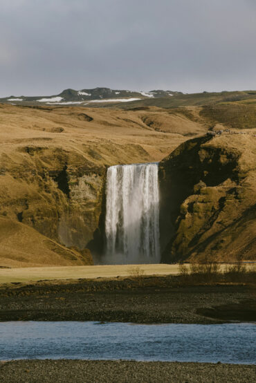 Skógafoss waterfall in South Iceland under morning light near Harmony Seljalandsfoss