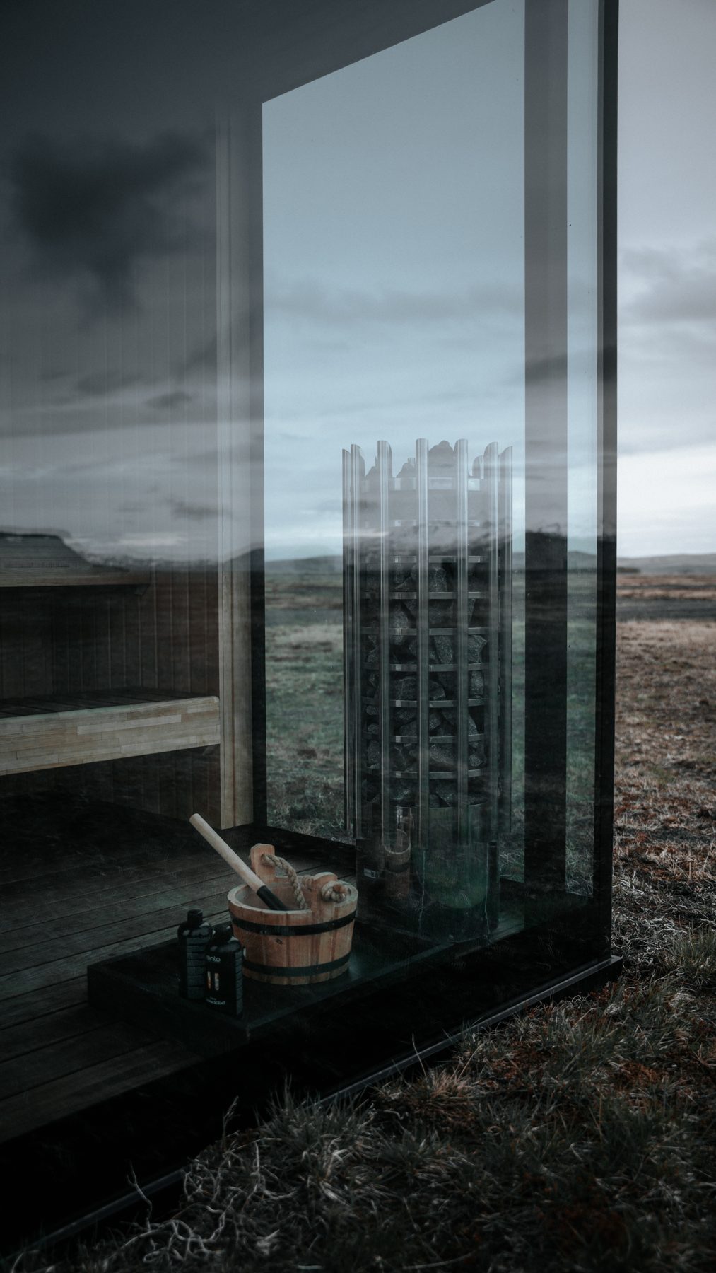 Panoramic glass sauna overlooking the South Iceland plain at Harmony lodge